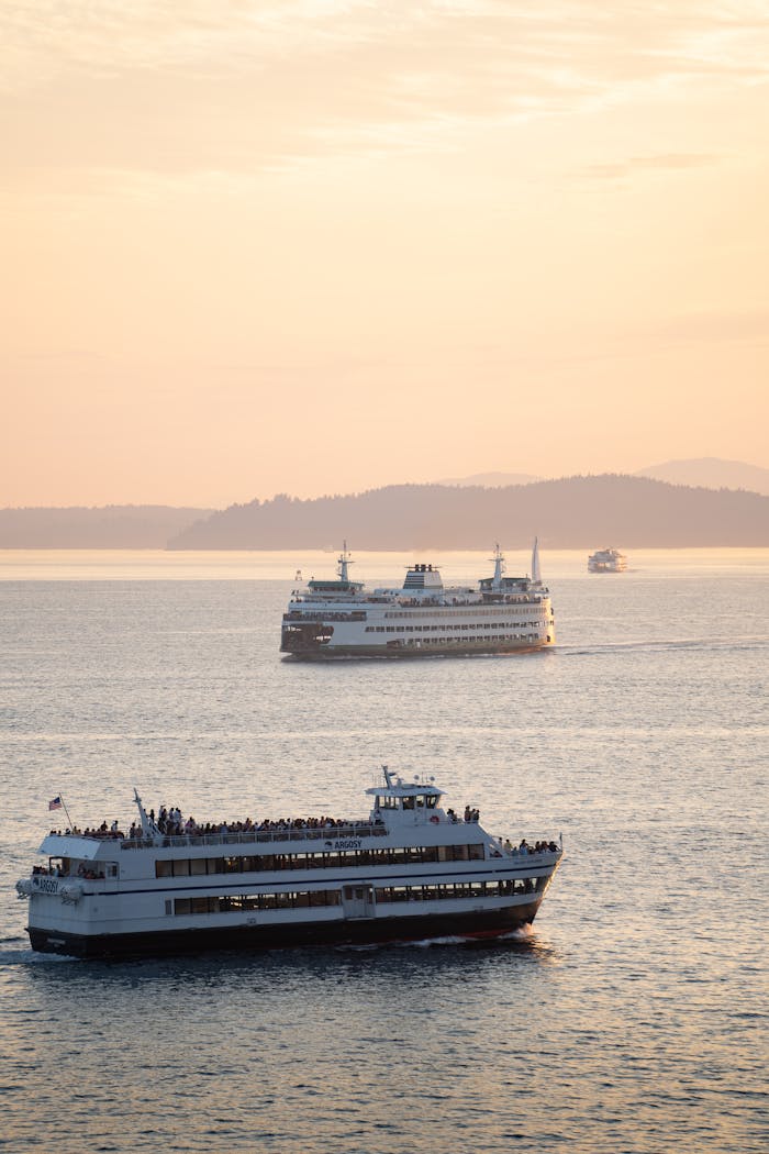 portfolio-02 Scenic view of passenger ferries sailing in Puget Sound at sunset near Seattle, WA.
